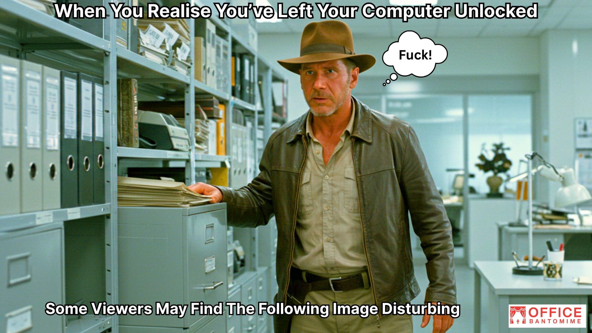 Indiana Jones stands in an office looking panicked, with the caption “When You Realise You’ve Left Your Computer Unlocked” and a thought bubble reading “F***!”, mimicking workplace panic.